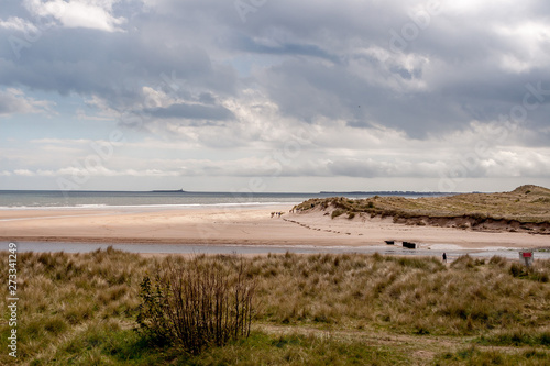 People walking on Alnmouth Beac