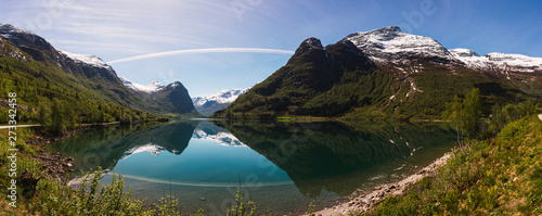 Crystal azure lake between hilly picturesque rocks