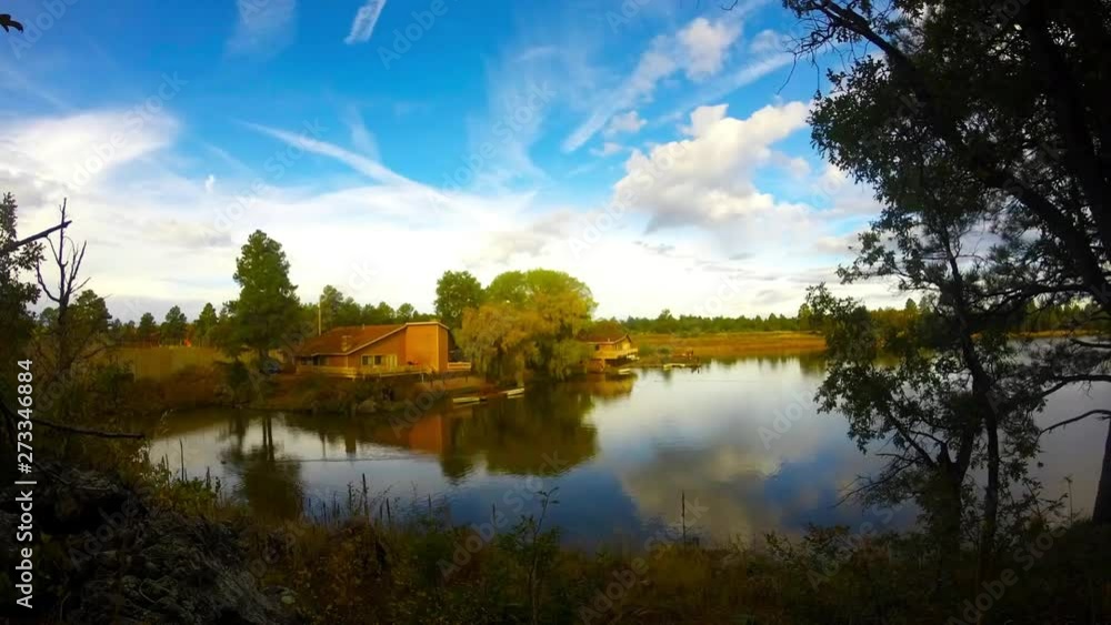Timelapse of a lake in show low with a cabin Timelapse of a lake in show low with a cabin