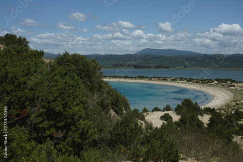 Voidokilia Beach, popular white sand and blue clear water beach in Messinia in Mediterranean area in shape of Greek letter omega, Peloponnese, Greece.