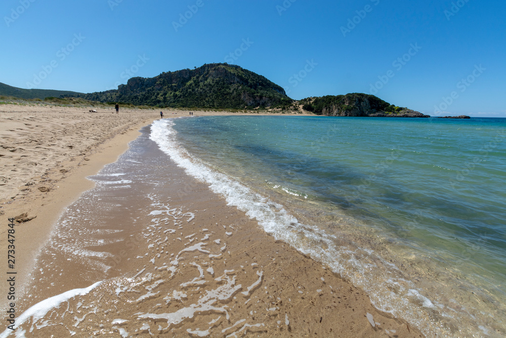 Voidokilia Beach, popular white sand and blue clear water beach in Messinia in Mediterranean area in shape of Greek letter omega, Peloponnese, Greece.