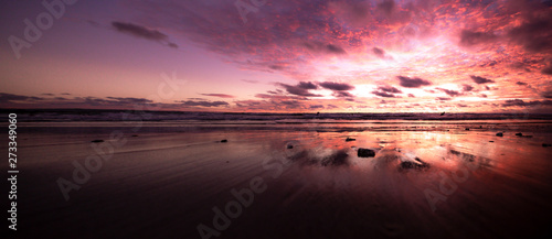 Big Panorama of purple pink sunset in Bali Indonesia