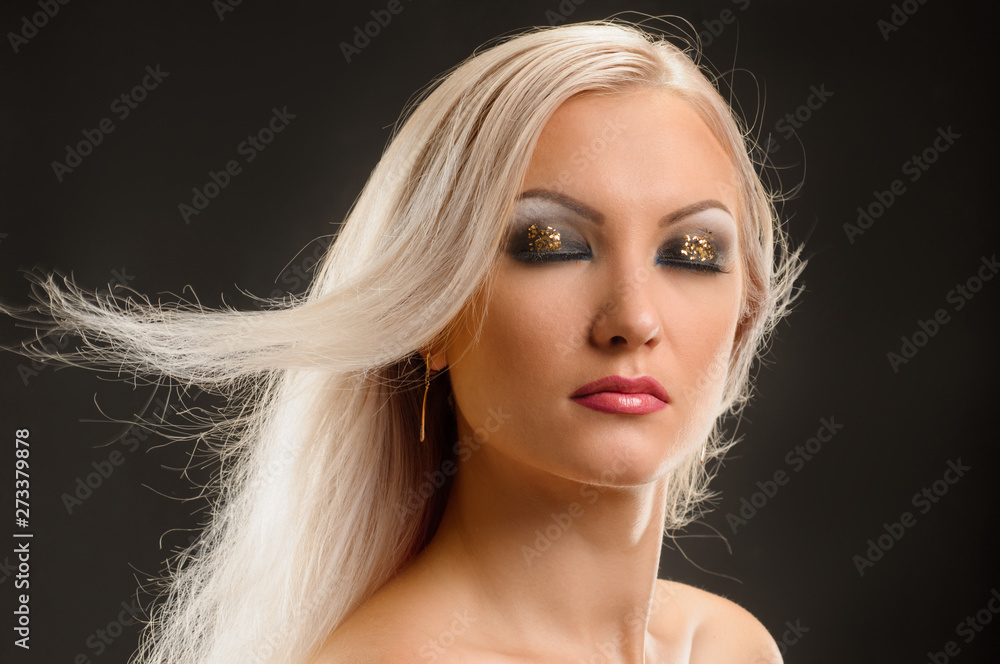 Portrait of atrractive blonde woman with party glitter makeup Portrait of atrractive blonde woman with party glitter makeup