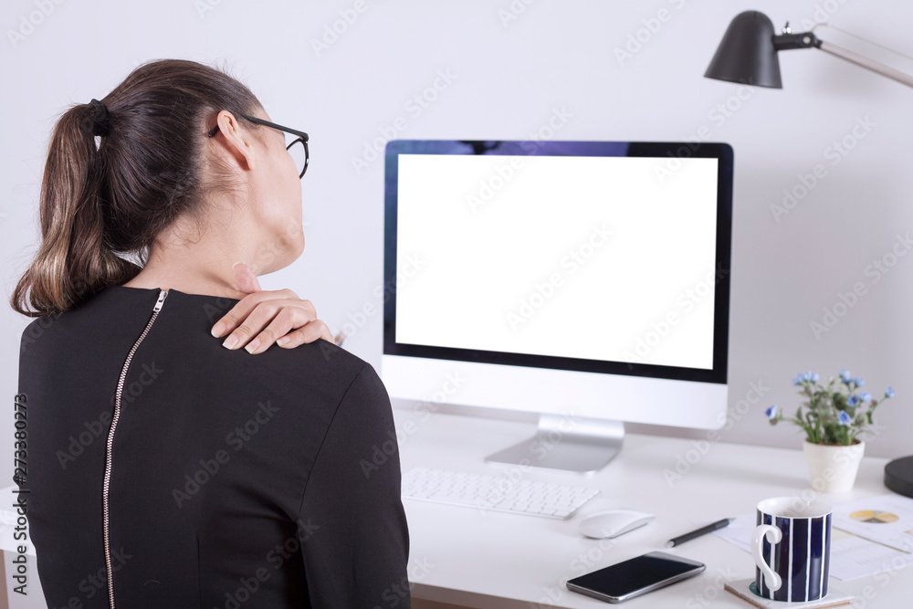 beautiful young businesswoman standing with crossed arms and smiling at camera in office beautiful young businesswoman standing with crossed arms and smiling at camera in office