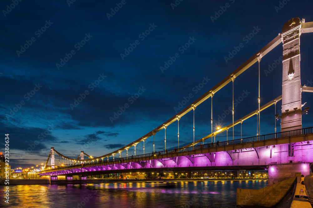 Fototapeta premium Sunset view of Krymsky Bridge (Crimean Bridge) in Moscow, Russia.