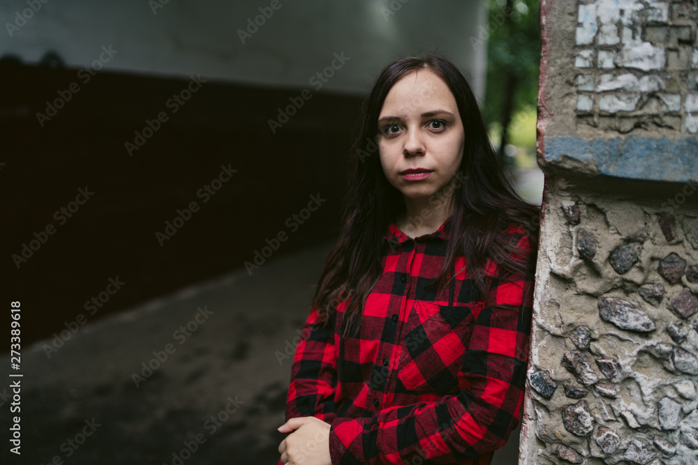 Young woman in casual clothes on the street. Young woman in casual clothes on the street.