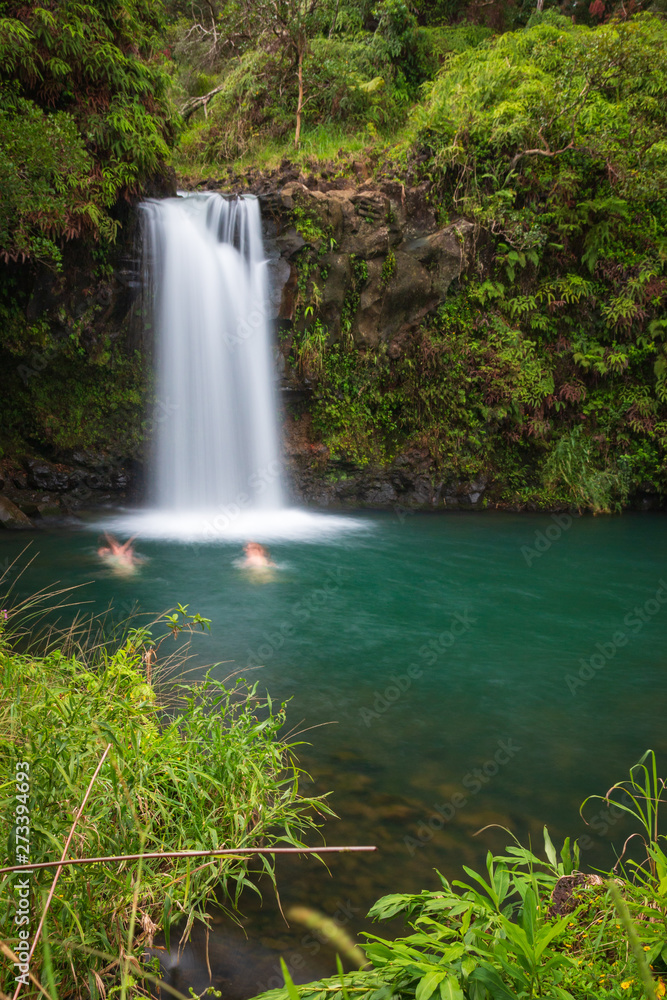 Fototapeta premium Long expo shot of Puaa Kaa Falls at mile 22 along Road to Hana, Maui, Hawaii, USA
