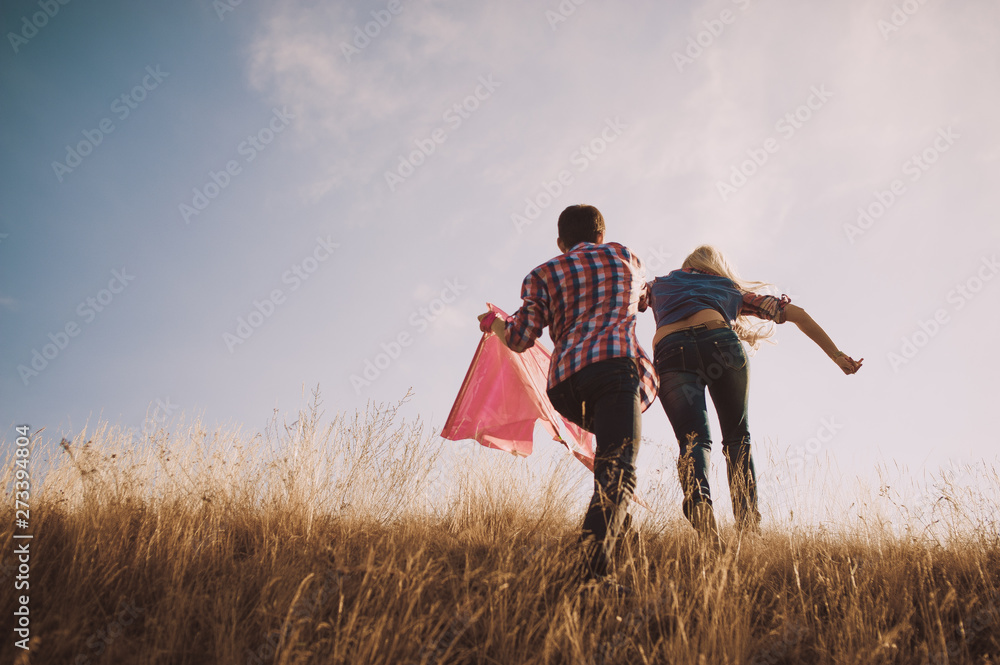 love,  man,  fun,  girl,  woman,  people,  child,  togetherness,  couple,  joy,  leisure,  grass,  sky,  fall,  romance,  nature,  outdoors,  two,  summer,  sunset