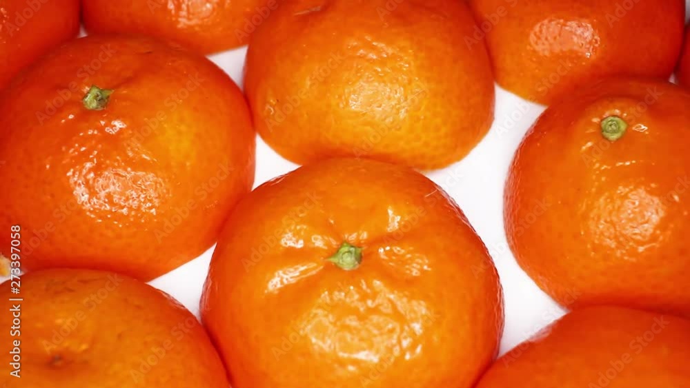 Half orange fruit fruits on rotating plate Half orange fruit fruits on rotating plate