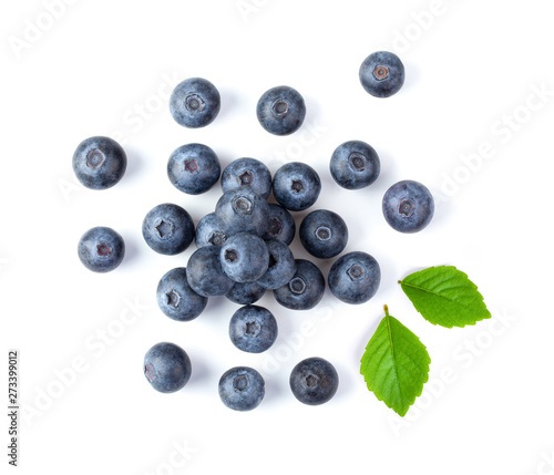 Blueberries and leaves isolated on white background. top view © supamas