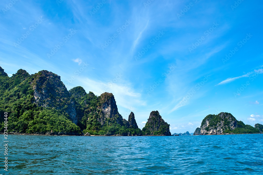 Ha long Bay, Vietnam - June 10, 2019: Little empty beach at Ha Long Bay,Vietnam. tourist attractions very popular in northern Vietnam. Ha long Bay, Vietnam - June 10, 2019: Little empty beach at Ha Long Bay,Vietnam. tourist attractions very popular in northern Vietnam.