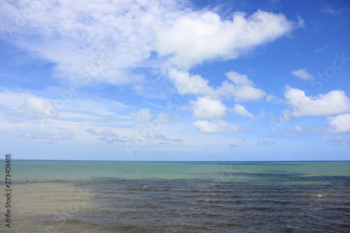 Blue sky with clouds over the sea for background, wallpapers, seascape and clear sky background. © Chaleow