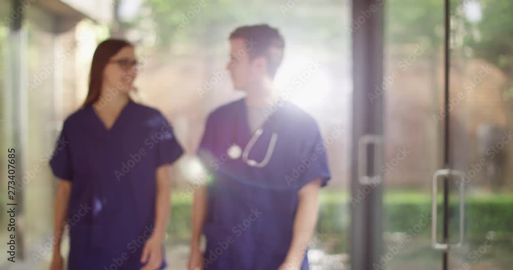 4K Fun candid shot of medical workers posing for portrait & making each other laugh. Slow motion. 4K Fun candid shot of medical workers posing for portrait & making each other laugh. Slow motion.