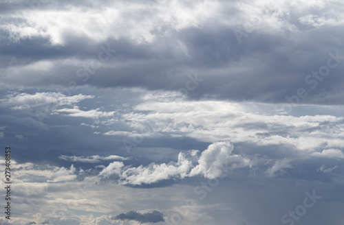 Fototapeta Naklejka Na Ścianę i Meble -  The Dark gray dramatic sky with large clouds in rainy seasons.
