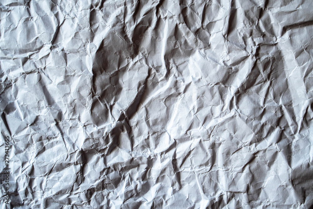Obraz premium Crumpled white paper background
