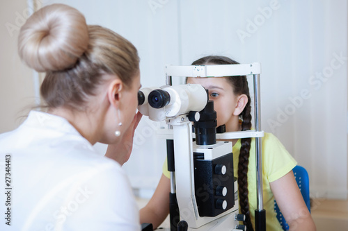 Female doctor ophthalmologist at clinic.