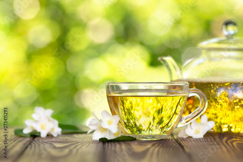 teapot and cup of jasmine tea