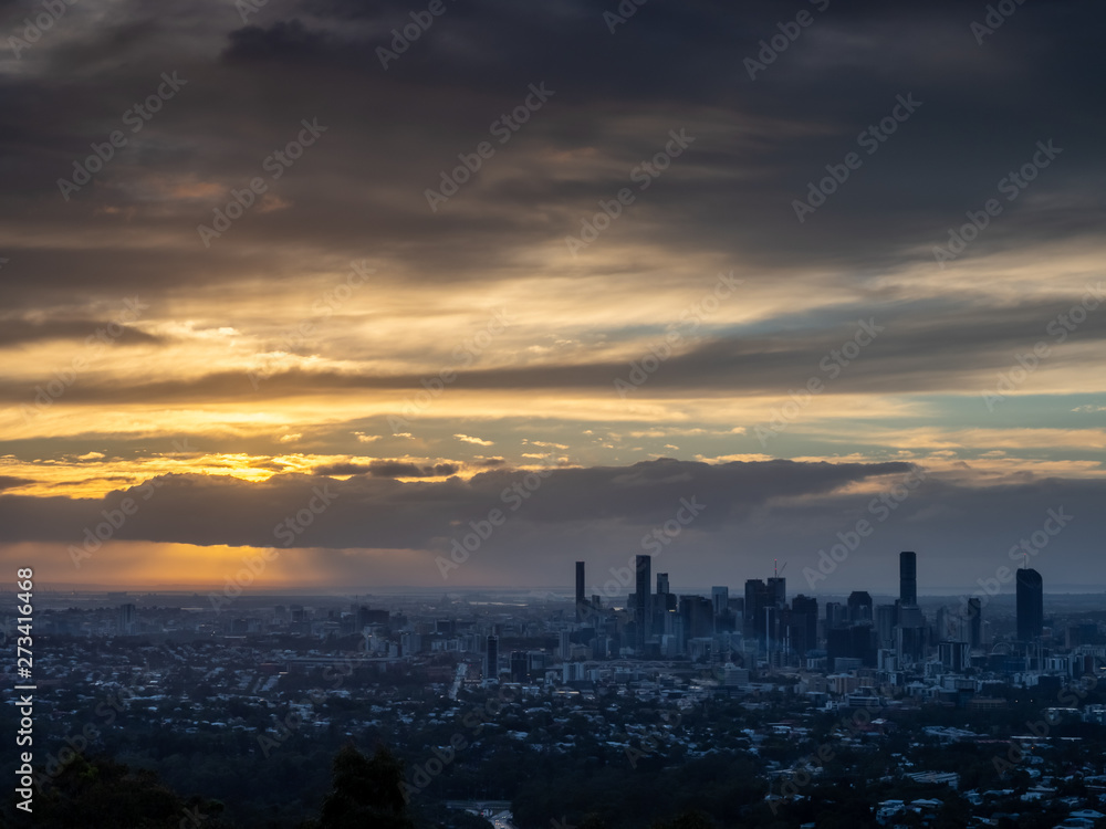 Sunrise Cityscape with Dramatic Sky