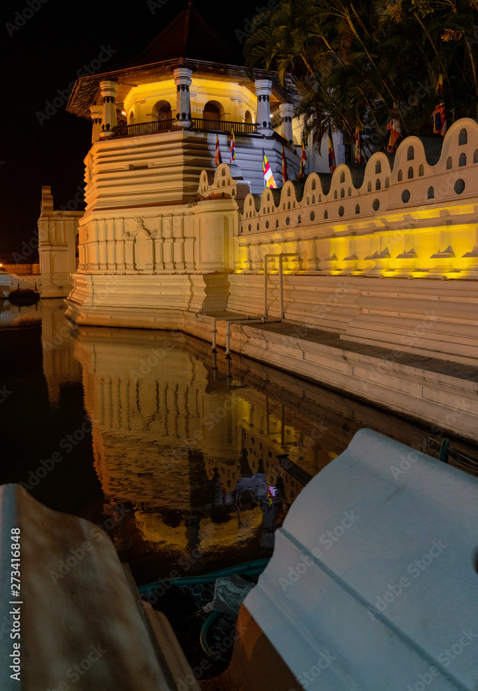 Temple of the Tooth Relic and Reflections Before Dawn in Kandy Sri Lanka.