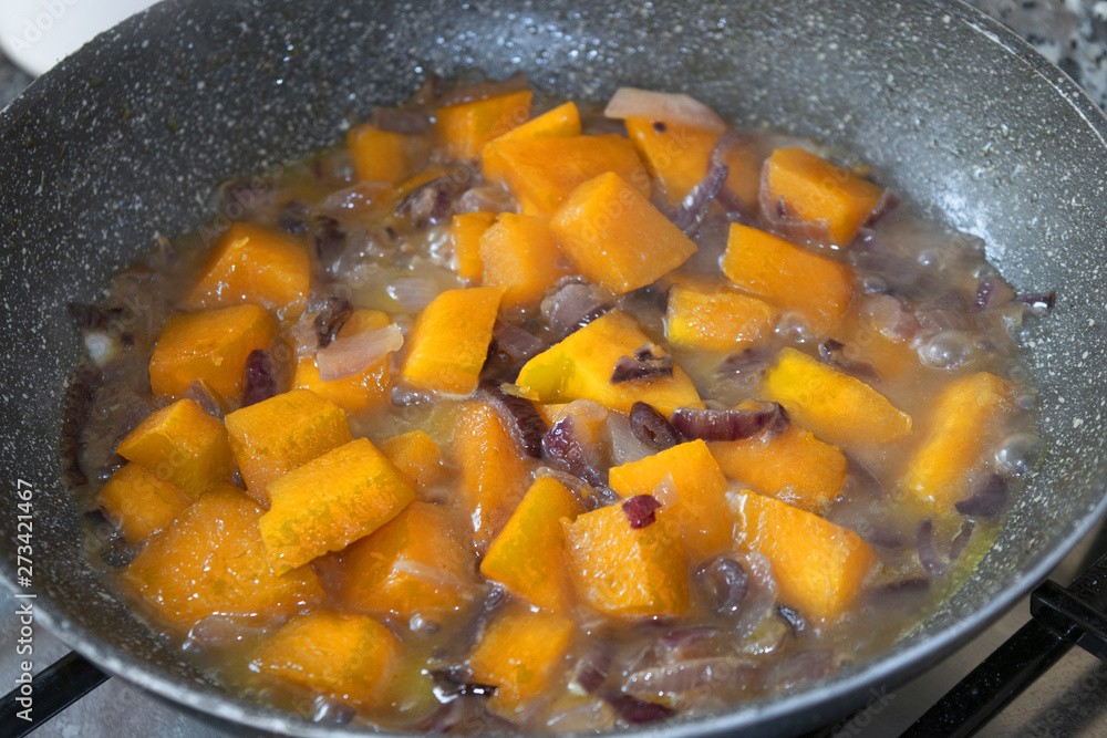 pumpkin diced stewed in pan pumpkin diced stewed in pan