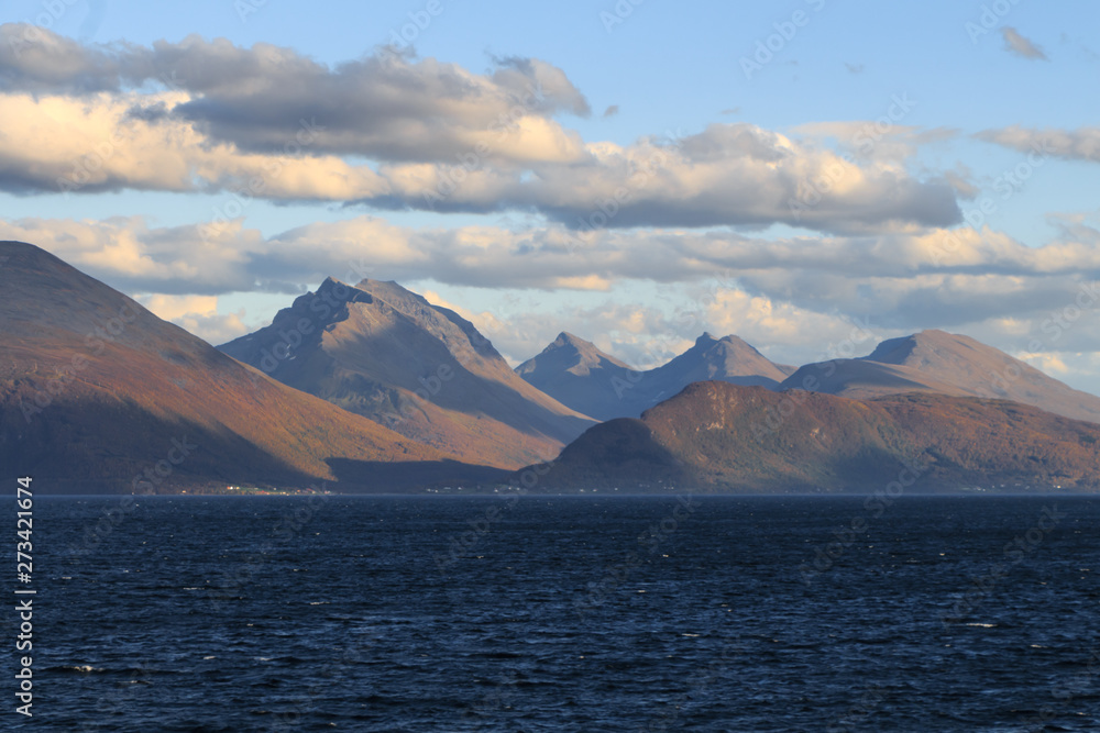 Norwegian fjords with rocky horizon at sunrise Norwegian fjords with rocky horizon at sunrise