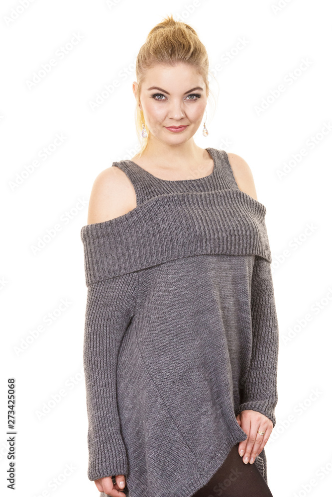 Woman wearing gray long top sweater tunic Woman wearing gray long top sweater tunic