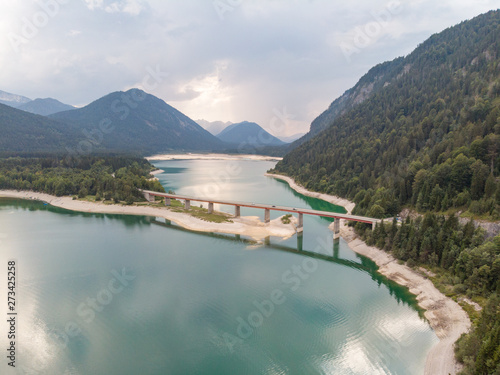 Germany  August 2018  Amazing turquoise lake Sylvenstein  upper Bavaria. Aerial view.