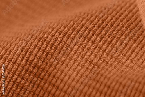 LIght brown color textile texture close up. Abstract background