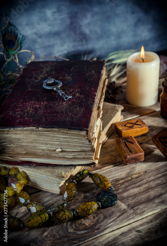 Magic book and witchery objects,  the practice of magic, enchantment, sorcery