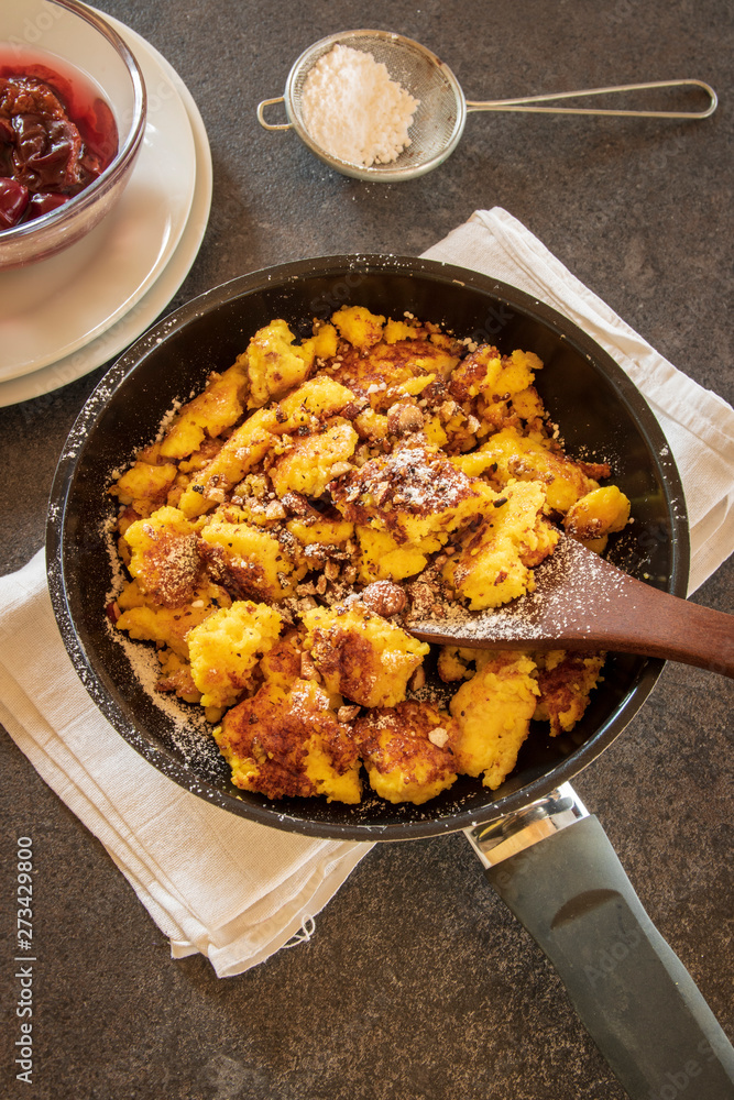 Kaiserschmarrn - traditional austrian pancake dessert Kaiserschmarrn - traditional austrian pancake dessert