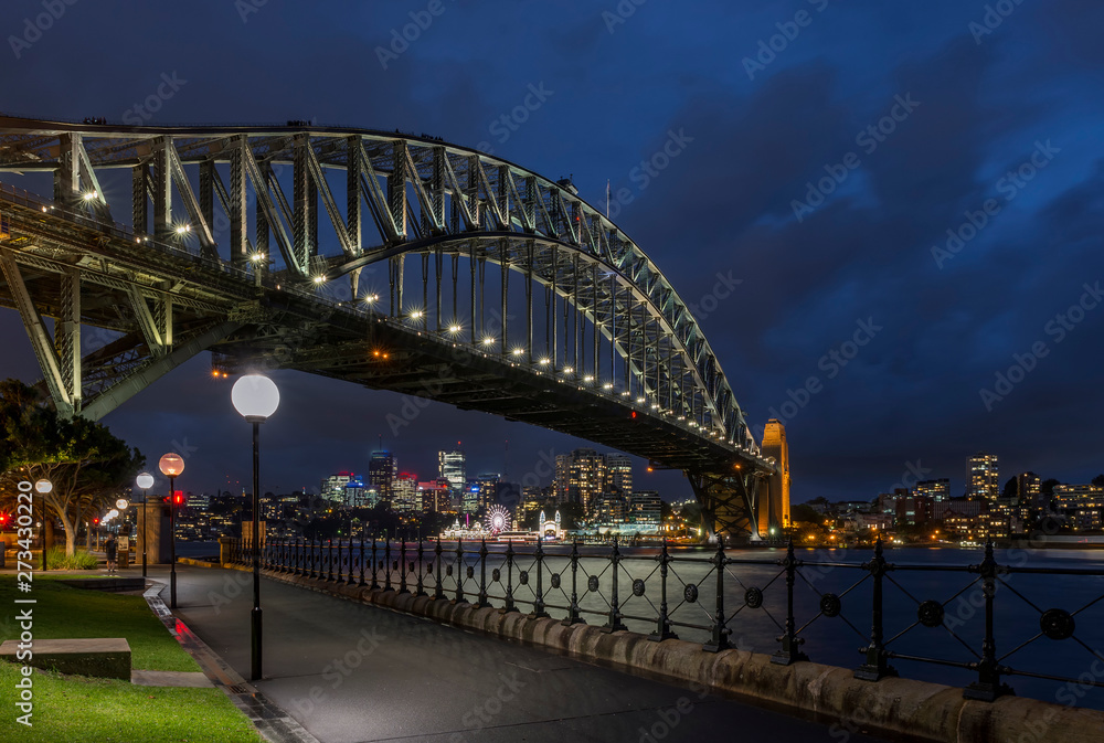 Beautiful view of the Harbour Bridge and the bay of Sydney, Australia, in the blue hour light Beautiful view of the Harbour Bridge and the bay of Sydney, Australia, in the blue hour light