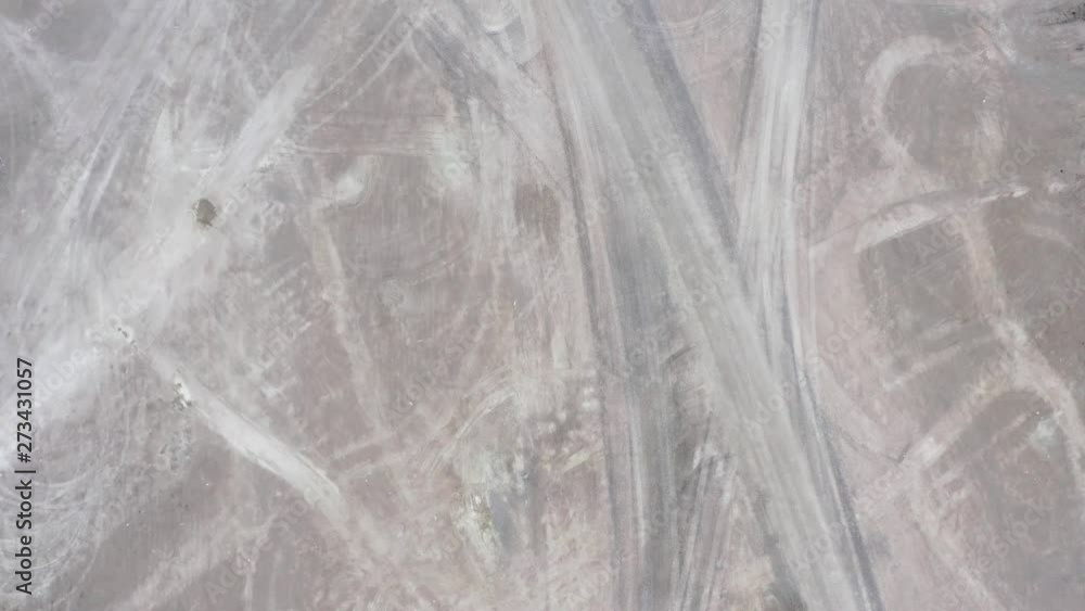 Top down forward aerial abstract of vehicle tracks in a quarry. Location Blekinge in Sweden.