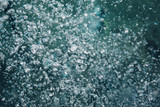 Air bubbles in sea water, abstract background