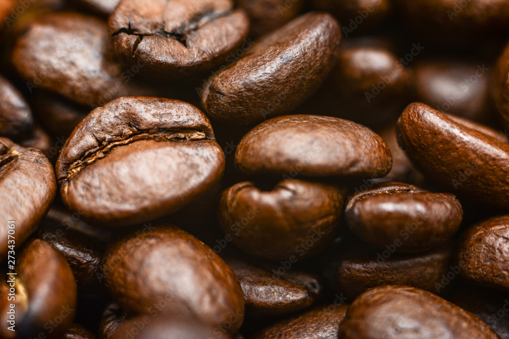 Coffee Beans Background. Close Up. Mixture of different kinds of coffee beans. Coffee Beans Background. Close Up. Mixture of different kinds of coffee beans.