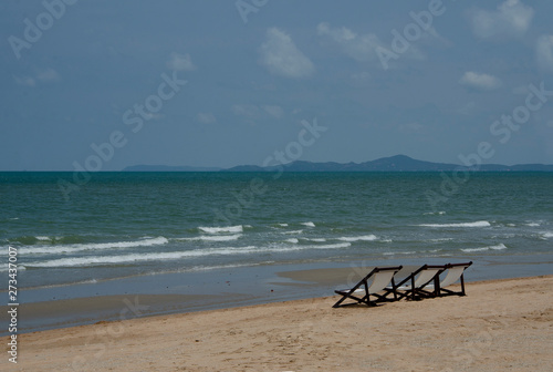 empty chair on sea beach with no people © sunyaluk