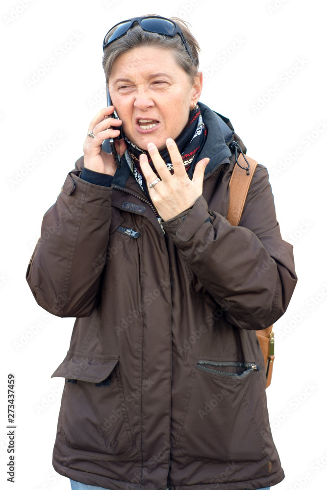 Middle-aged woman swears by mobile phone. isolated on white background Middle-aged woman swears by mobile phone. isolated on white background