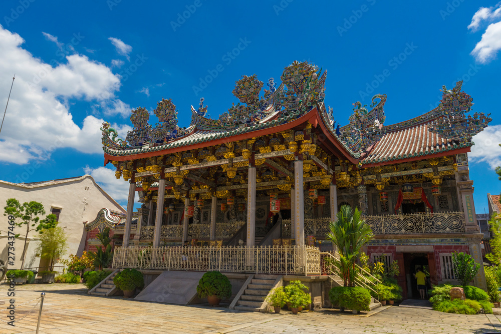 Exterior view of Leong San Tong Khoo Kongsi clanhouse against blue sky in Penang, Malaysia