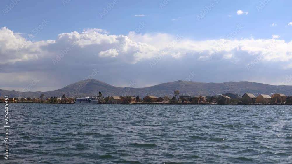 Travelling by ship from Puno to the Uros Islands on Lake Titicaca, Peru, South America Travelling by ship from Puno to the Uros Islands on Lake Titicaca, Peru, South America