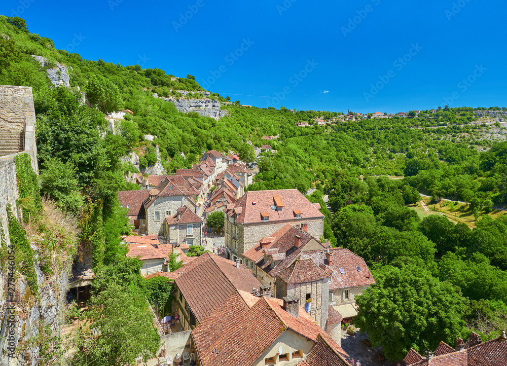 Landscape view of the main street of the medieval french village of Rocamadour, Lot Department, Quercy, Occitanie Region, France. UNESCO world heritage site.
