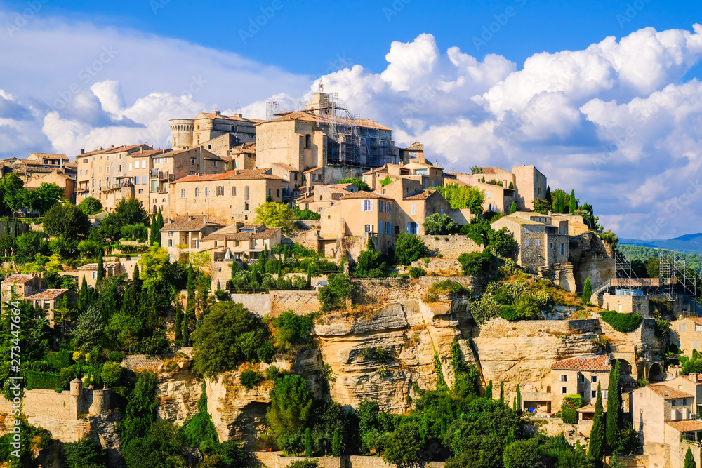 Gordes, a small medieval town in Provence, France. Panoramic view on the top and ledges of the roof of this beautiful village.