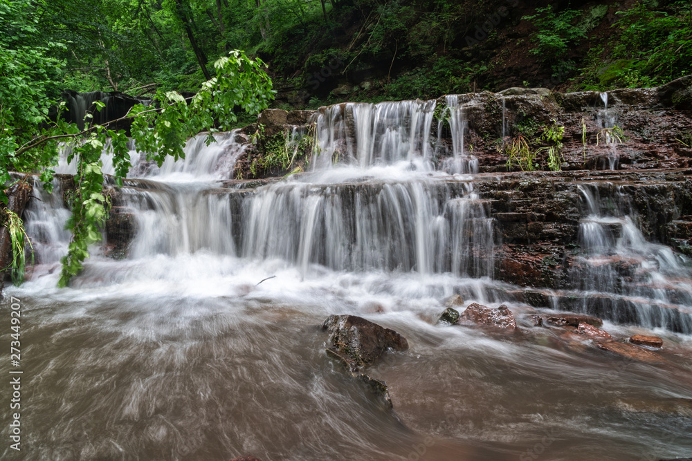 Obraz premium Mountain river waterfall landscape. Cascade of Dzhurynskyi waterfall.