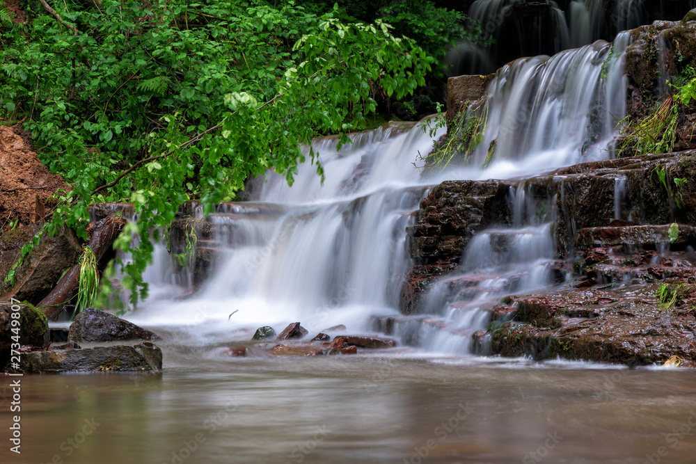 Fototapeta premium Mountain river waterfall landscape. Cascade of Dzhurynskyi waterfall.