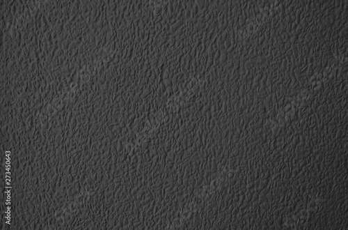 Texture of The Black Stucco Wall Background