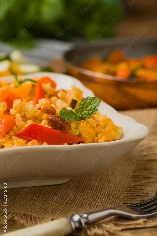 Millet with vegetables and raisins. Millet with vegetables and raisins.