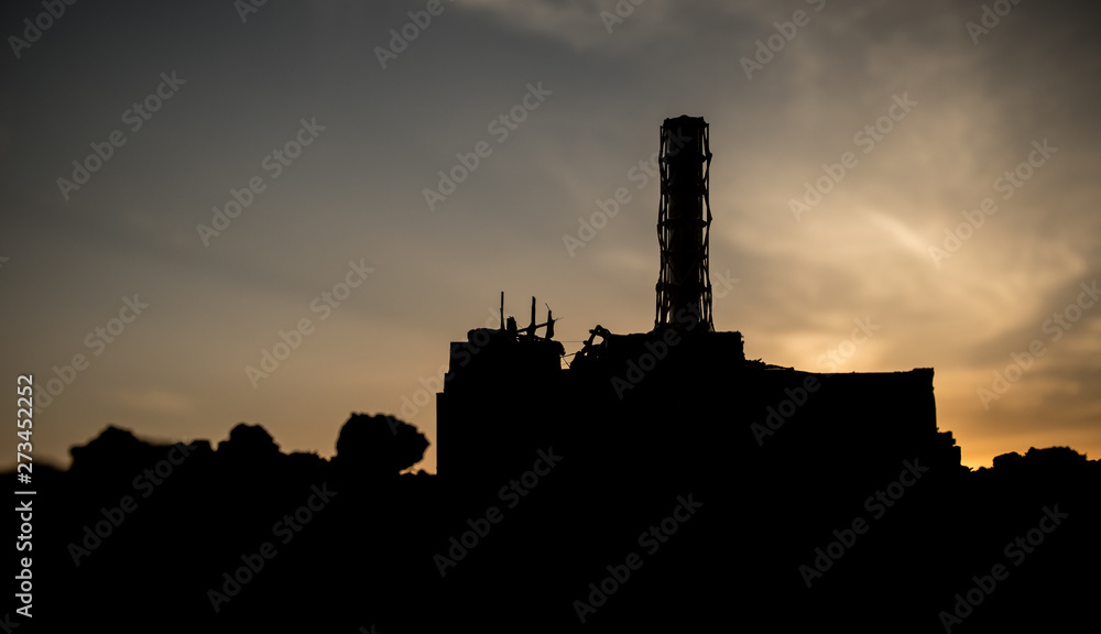 Fototapeta premium Creative artwork decoration. Chernobyl nuclear power plant at night. Layout of abandoned Chernobyl station after nuclear reactor explosion.