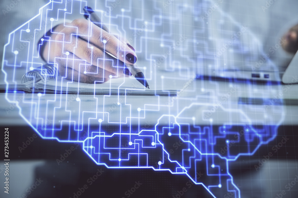 Multi exposure of woman's writing hand on background with brain hologram. Concept of brainstorming. Multi exposure of woman's writing hand on background with brain hologram. Concept of brainstorming.