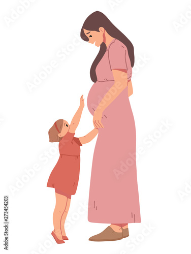 Little girl touches her pregnant mom s belly.