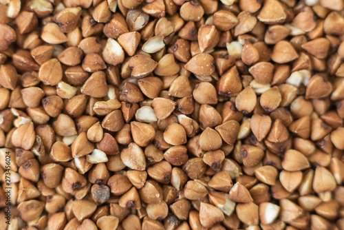 Buckwheat groats  macro photo  top. Dried seeds. Food photo  closeup.