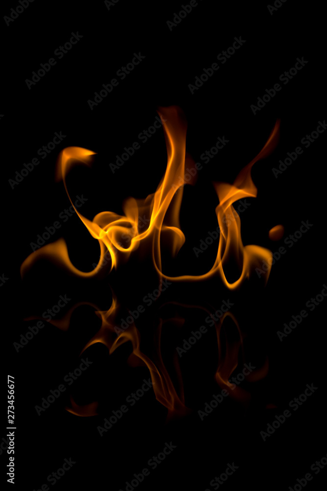 Flames with a black background. Close up. Flames with a black background. Close up.