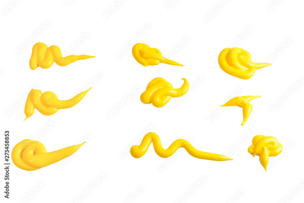 Fototapeta premium Yellow sauce splashes isolated on white background.